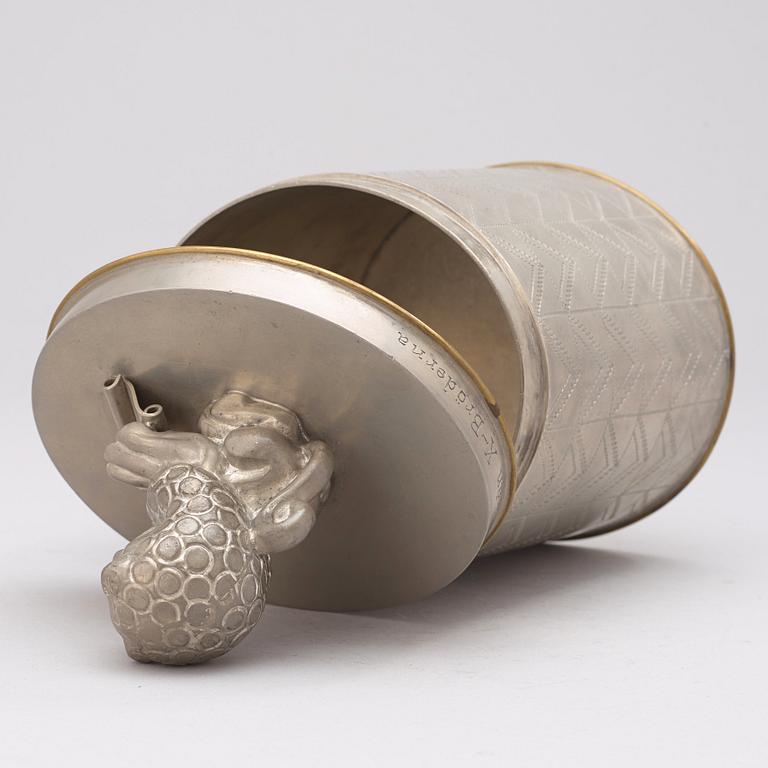 An Anna Petrus pewter and brass lidded jar, Svenskt Tenn, Stockholm 1928.