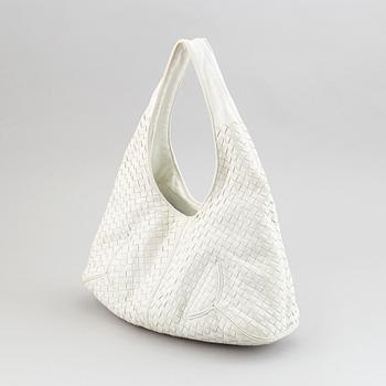 Bottega Veneta, a white intrecciato leather hobo bag.