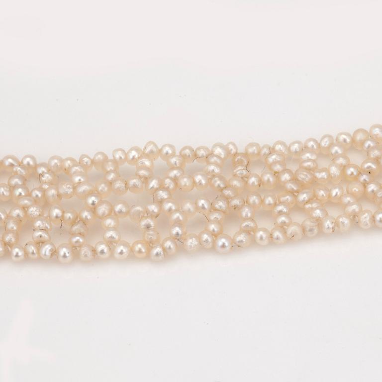 A natural seed pearl lace necklace.