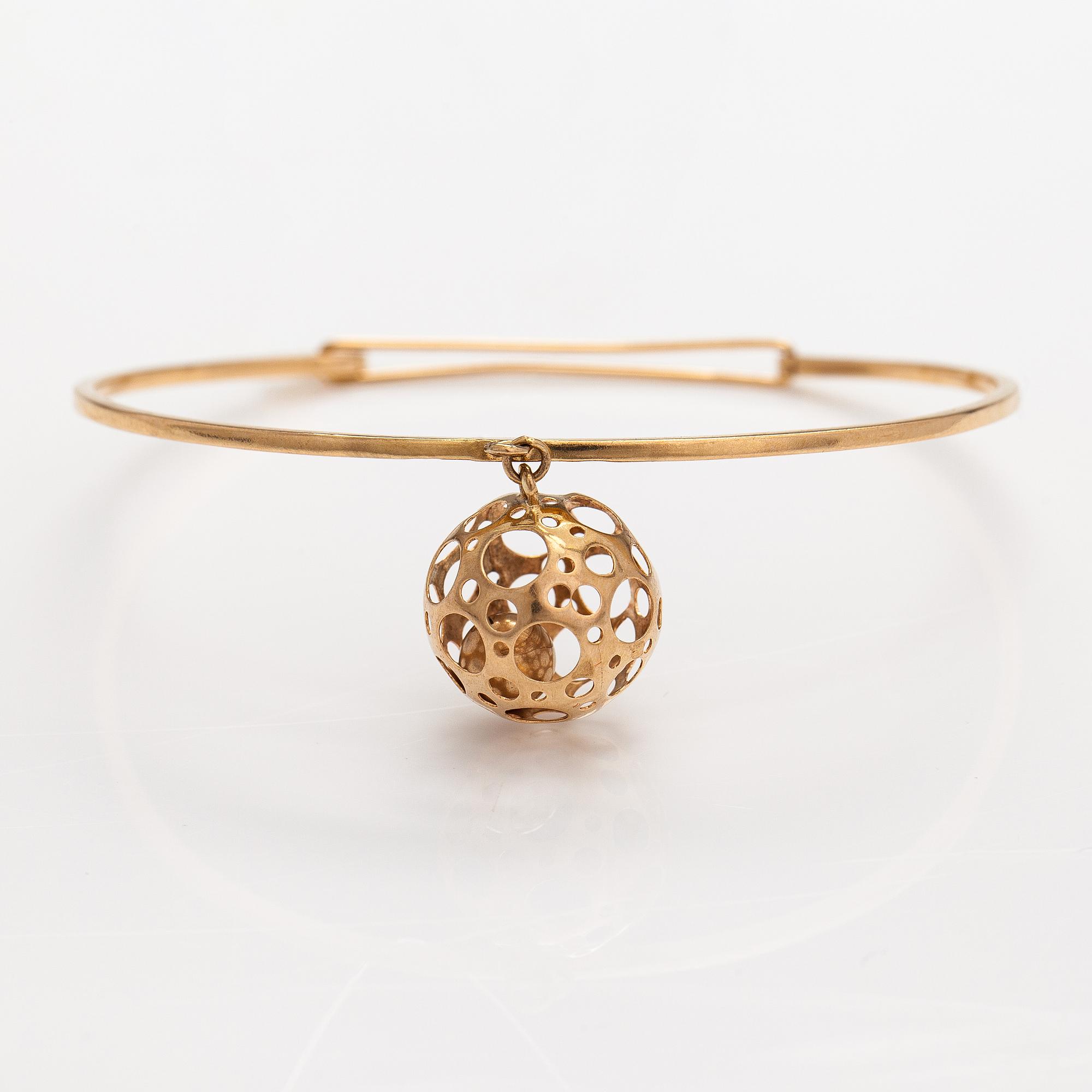 Liisa Vitali, A 14K gold bracelet "Leppäkerttu". Westerback, Helsinki 1969.