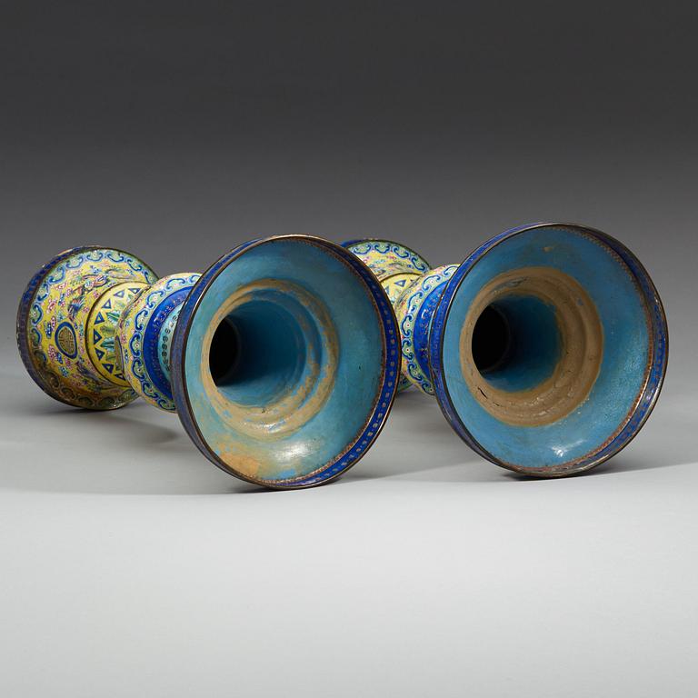 A pair of enamel on copper vases, Qing dynasty, 19th Century.