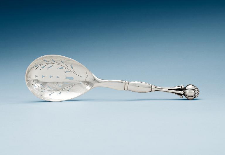 A Georg Jensen strainer spoon, Copenhagen 1915-27.