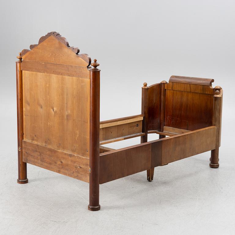 A late Empire bed, mid-19th century.