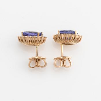 Earrings with tanzanites and brilliant-cut diamonds.