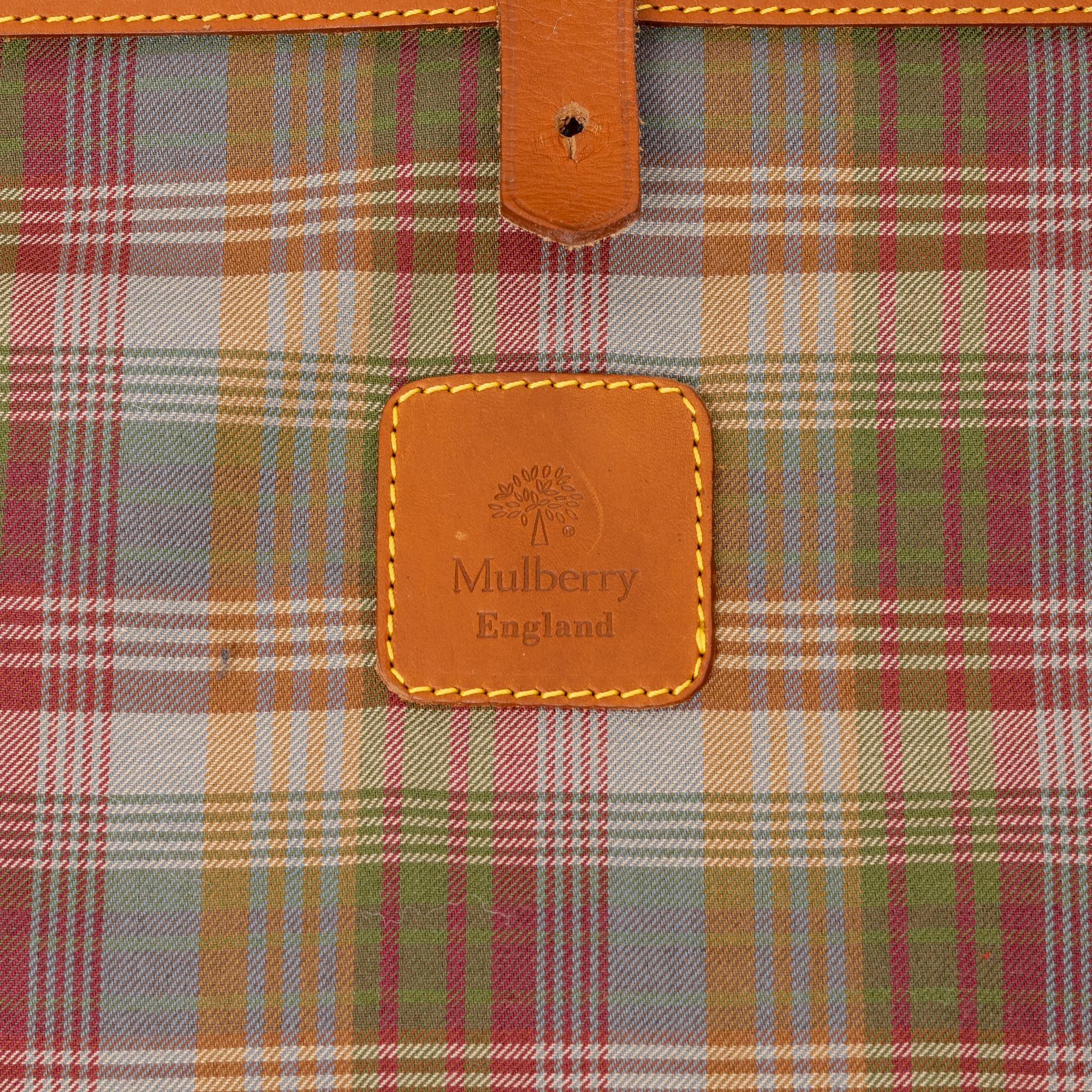 Mulberry, a scotch grain suitcase.