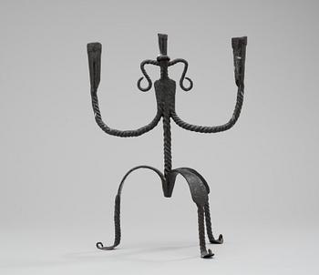 655. A Swedish iron candelabra, 18/19th century.