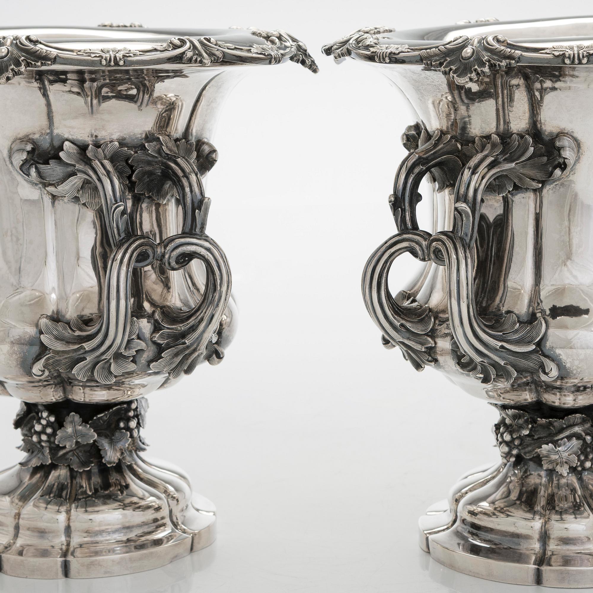 Carl Johan Tegelsten, A pair of Neo-Rococo silver champagne coolers/ vases, maker's mark of Carl Johan Tegelsten, Saint Petersburg 1849.
