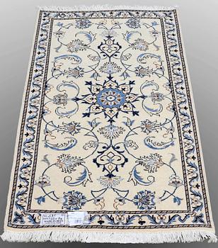 Two Nain rugs ca 133 x 70  resp 132 x 70 cm.