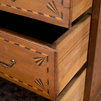 A writing cabinet, probably from Småland, first half of the 19th century.