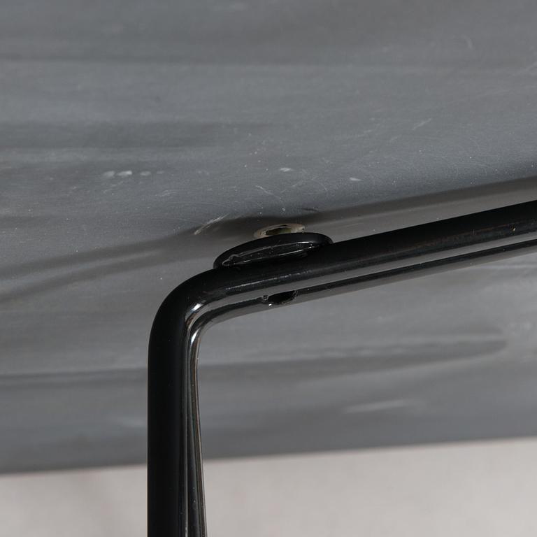 Lella and Massimo Vignelli, A "Paperclip" table in slate from Knoll 1994.