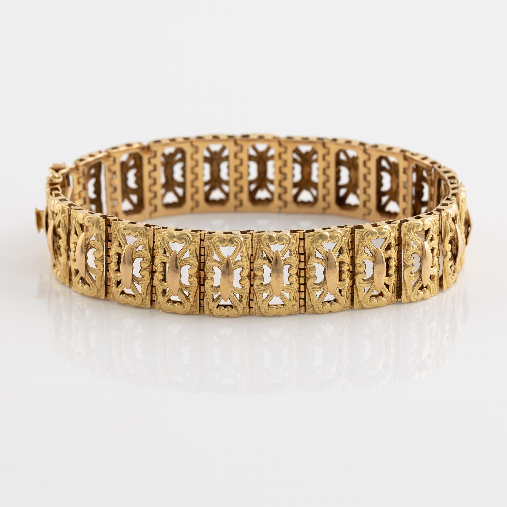 18K gold, Italian mark, Verona.