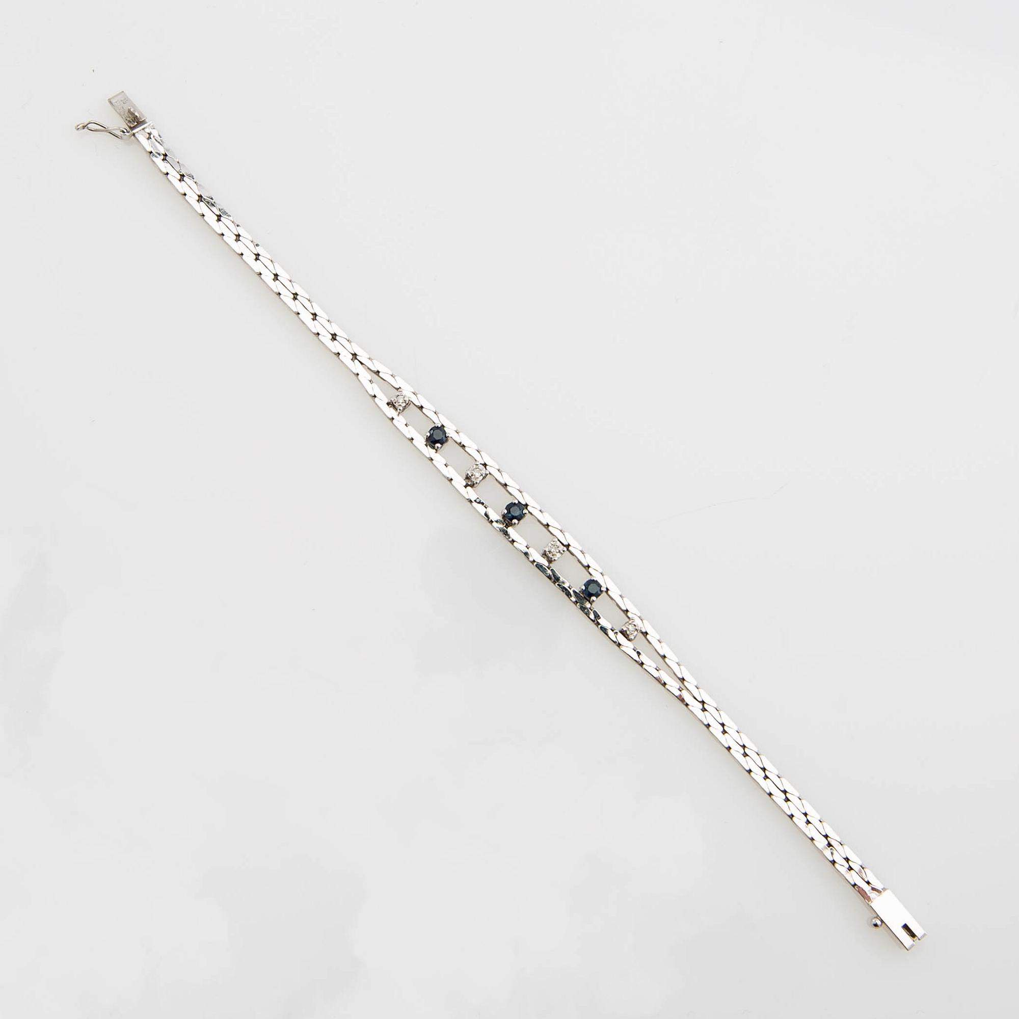 Armband, 14K guld med diamanter och safirer.