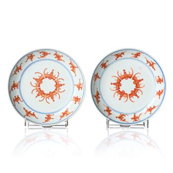 1133. A pair of iron-red decorated 'bats' dishes, Qing dynasty, Guangxu mark and period (1875-1908).