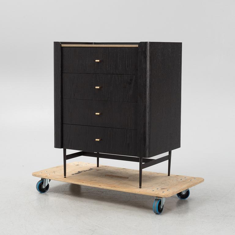A black stained oak veneered 'Milano' dresser with top covering of faux stingray skin.