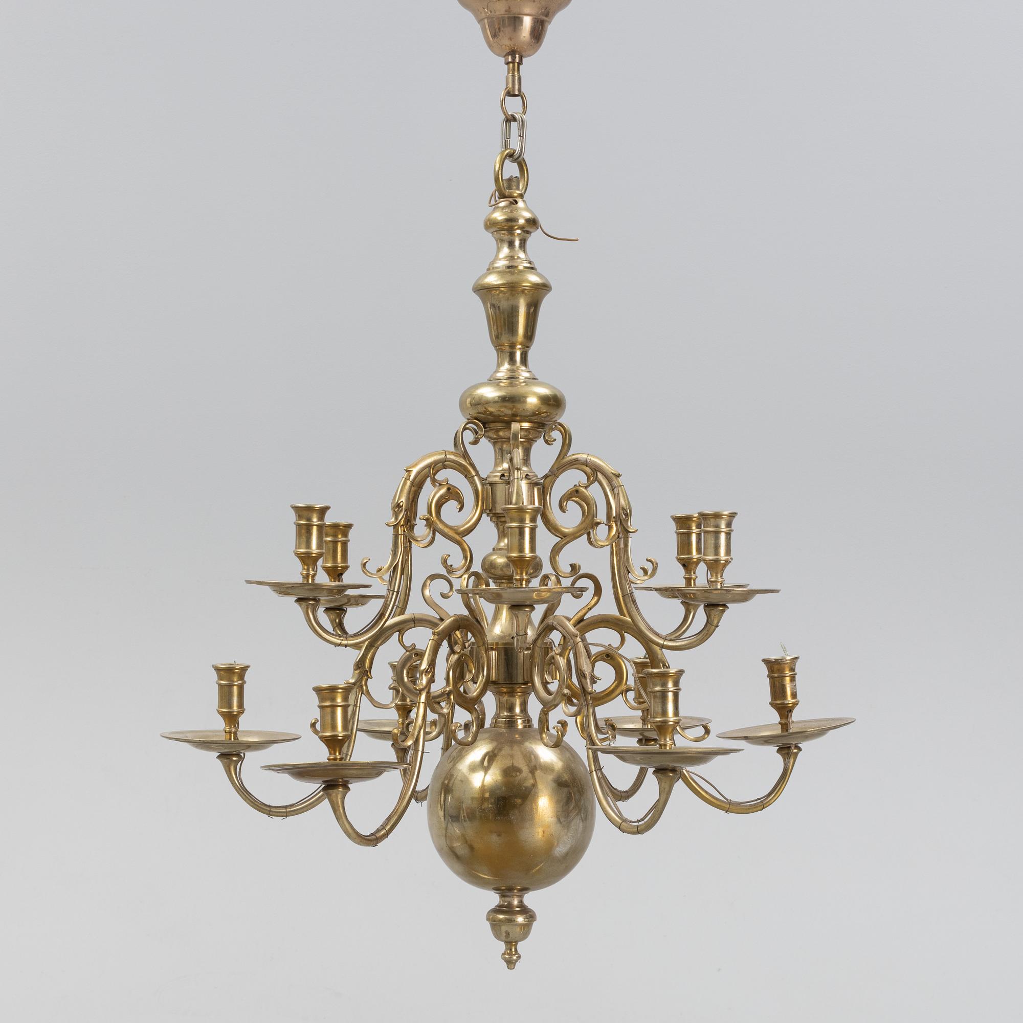 A brass Baroque style chandelier, 20th Century.