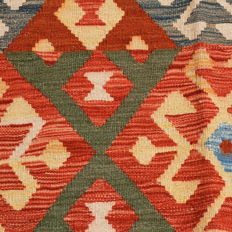 A kelim rug, 290 x 196 cm.