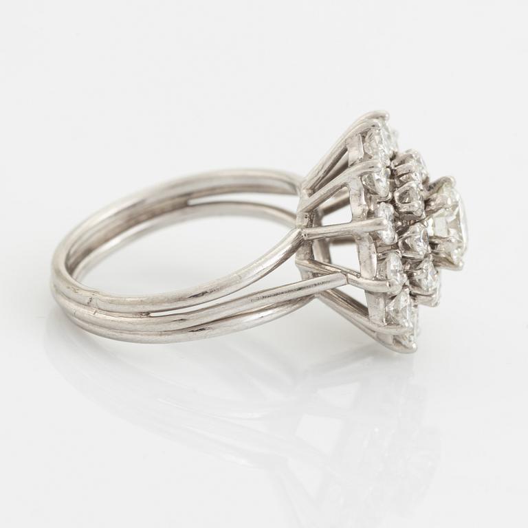 Brilliant cut diamond cluster ring.