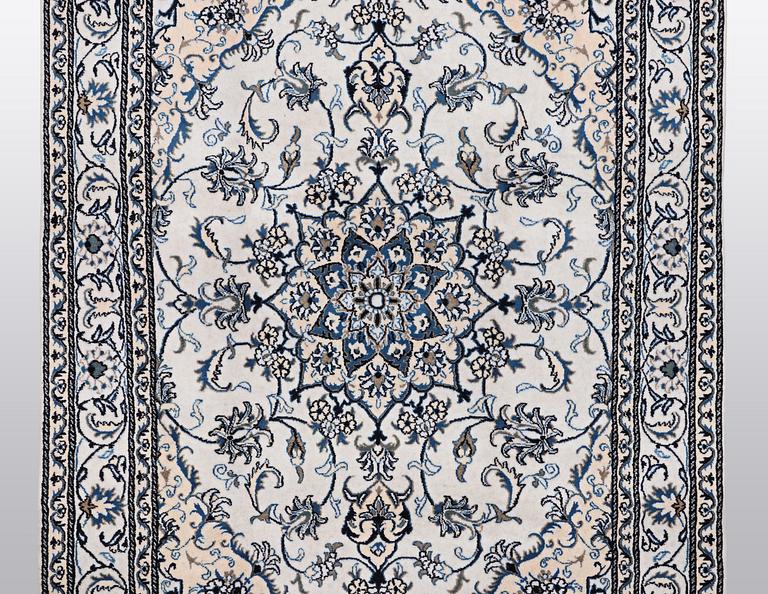 A rug, Nain, part silk, so called 9 LAA, ca 233 x 164 cm.