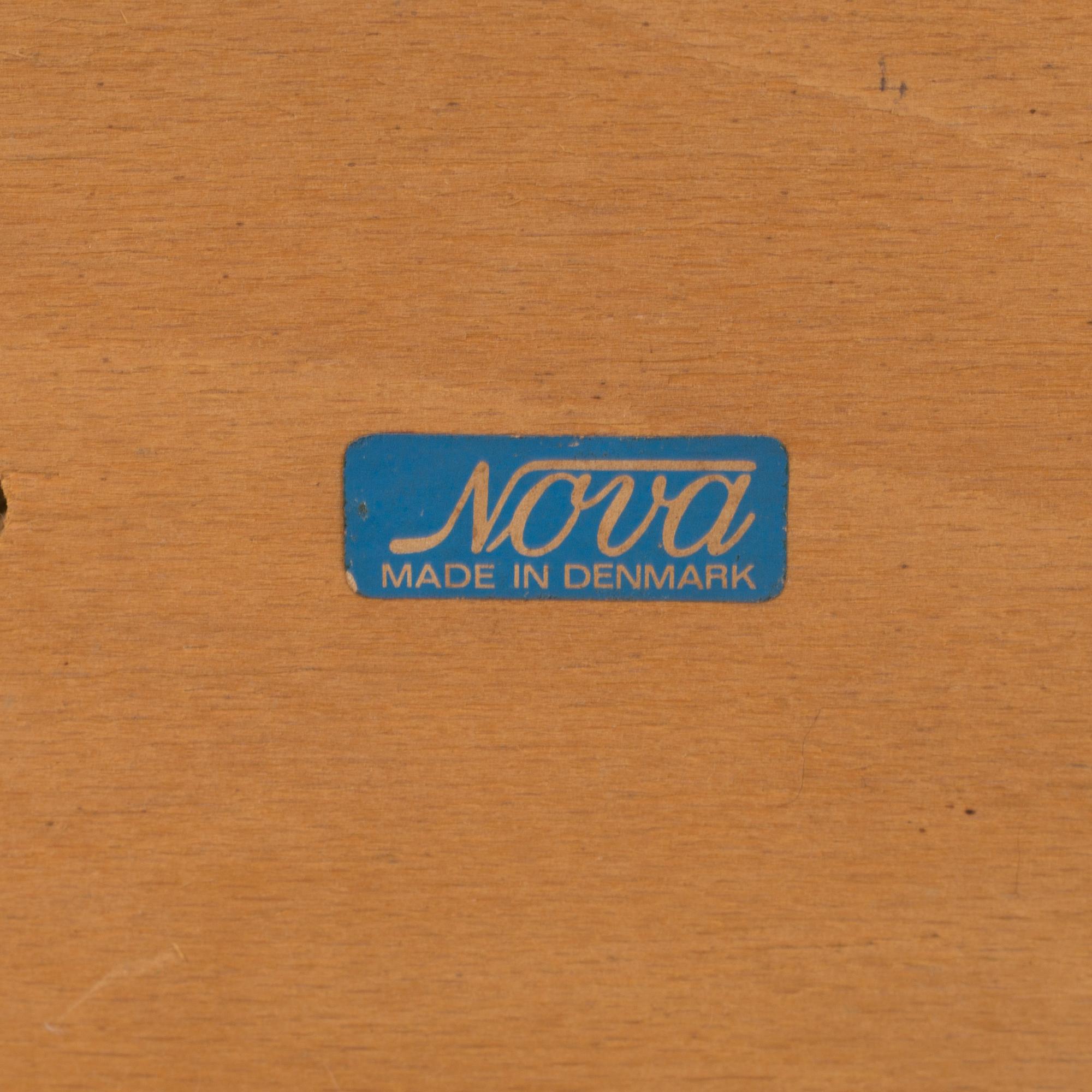 Four 60s "Nova" dining chairs from Denmark.