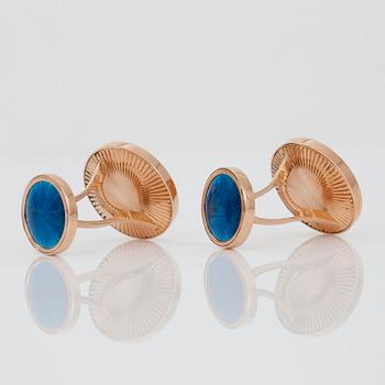 A pair of cufflinks, blue enamel and brilliant cut diamonds.