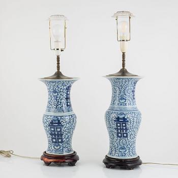 A pair of Chinese porcelain table lamps, early 20th Century.