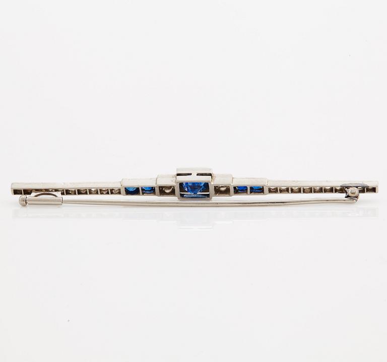 A brooch set with sapphires, old- and rose cut diamonds.