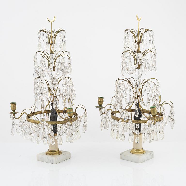 A pair of late Gustavian style girandoles, from around the year 1900.