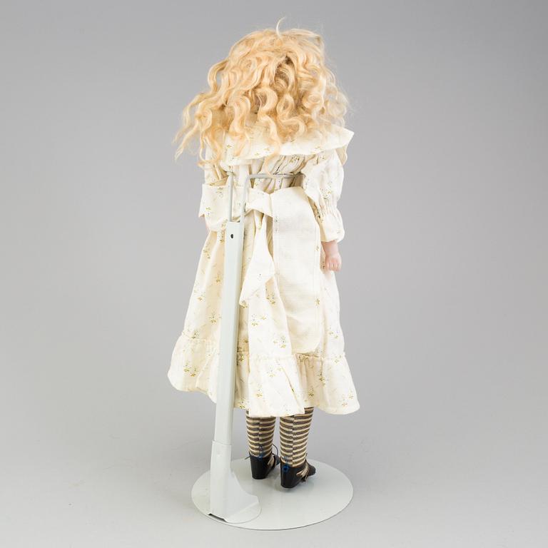 a Armand Marseille porcelain doll from around 1900.