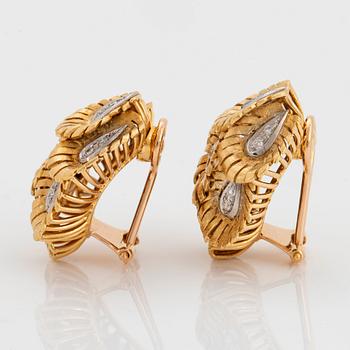 A pair of 18K gold earrings set with eight-cut diamonds.