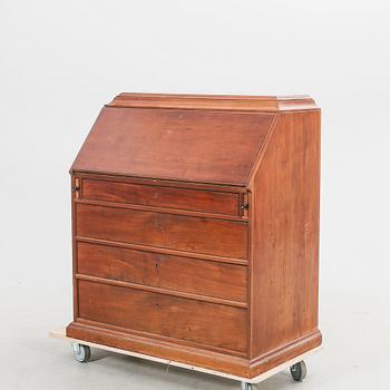 A mahogany flap secretaire first half of the 20th century.