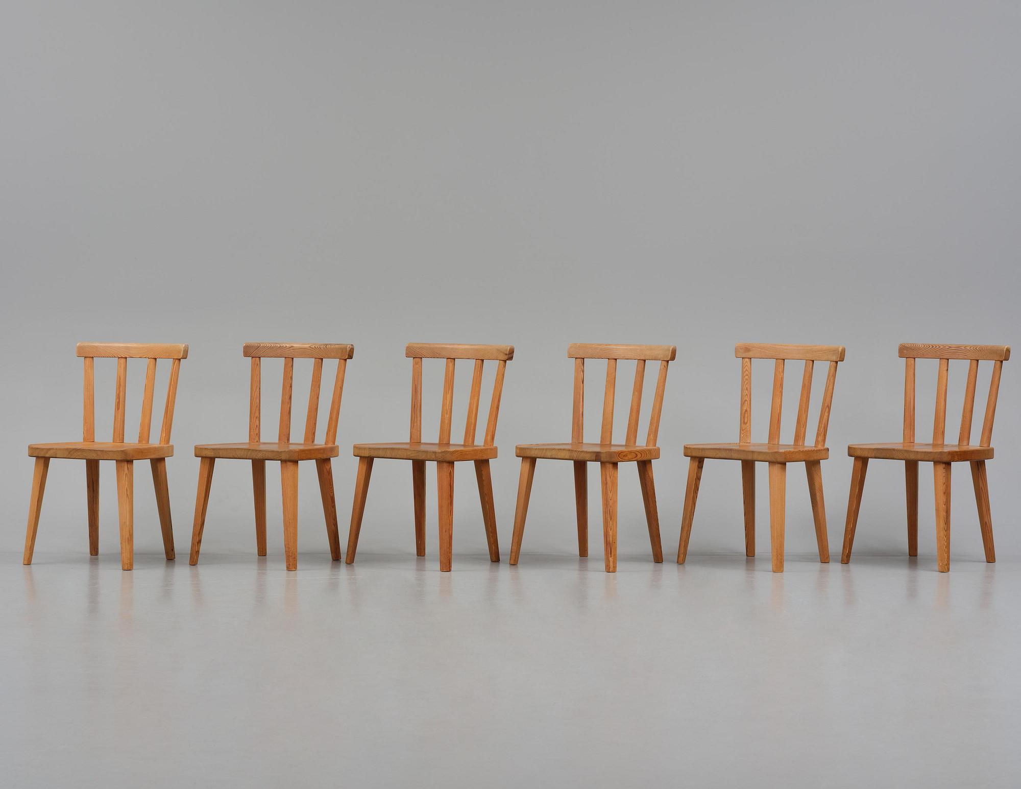 Axel Einar Hjorth, a set of six stained pine "Utö" chairs, Nordiska Kompaniet, Sweden, 1930s.