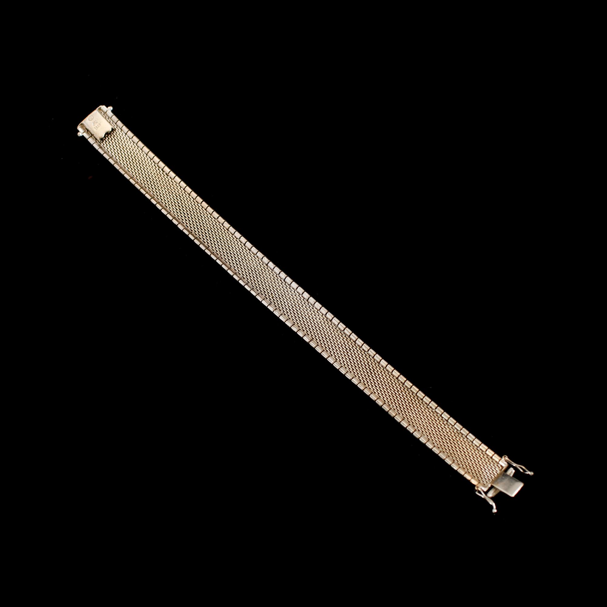 ARMBAND, 18 k vitguld, 1960-tal. Vikt ca 32 g.