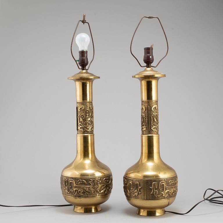 A pair of Chinese brass table lamps, 20th century.