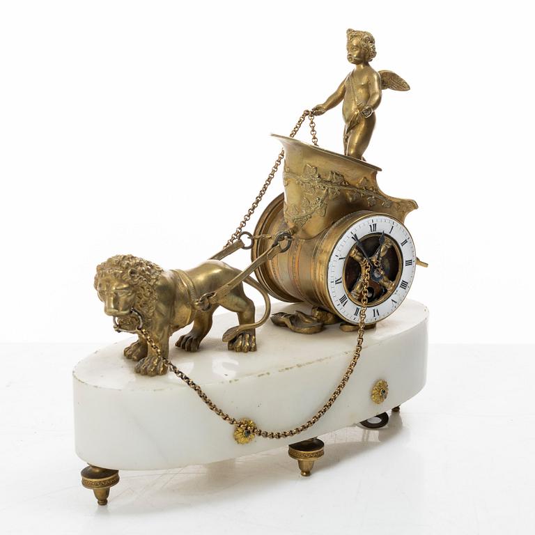 An Empire table clock, likely Northern Europe, early 19th century.