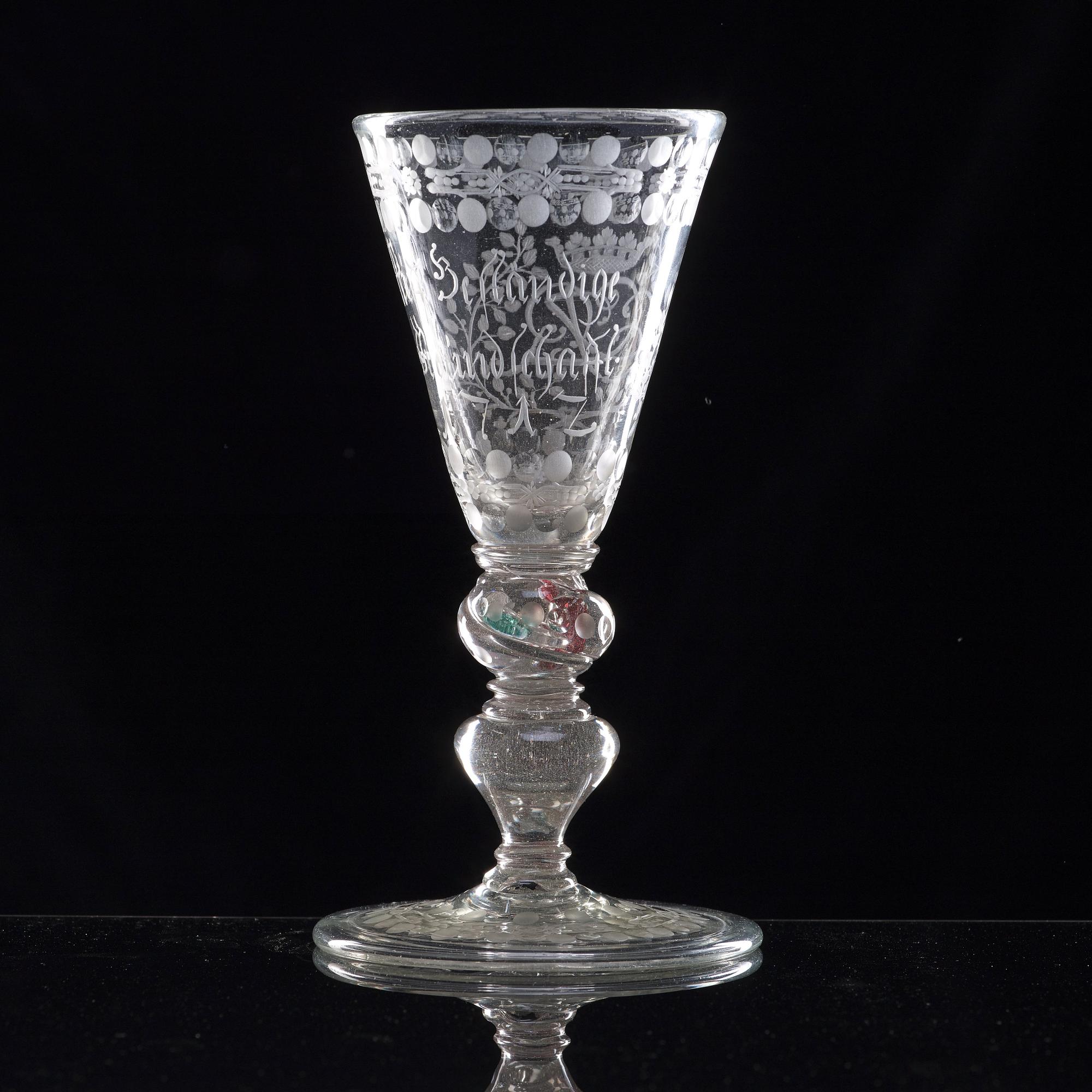 A German cut and engraved glass goblet, 18th Century.