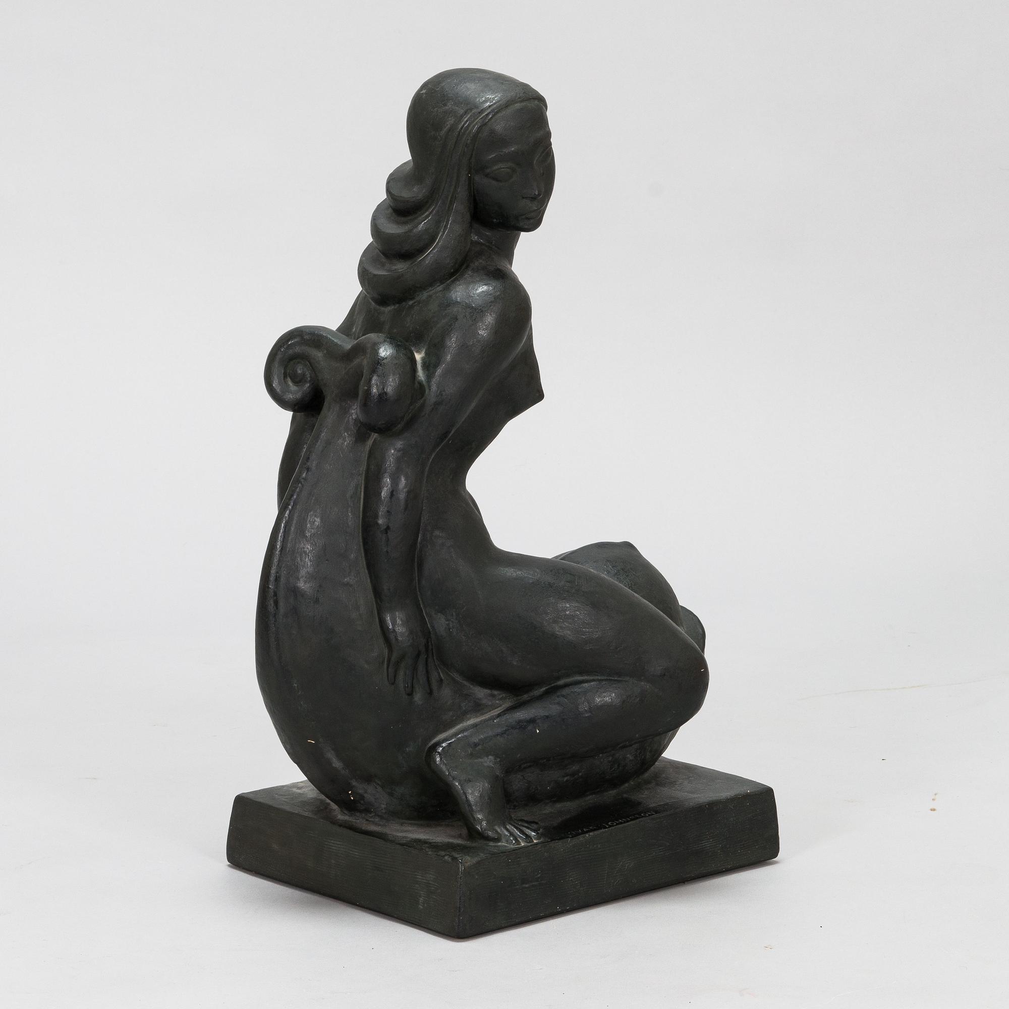 Ivar Johnsson, a painted plaster sculpture, signed.