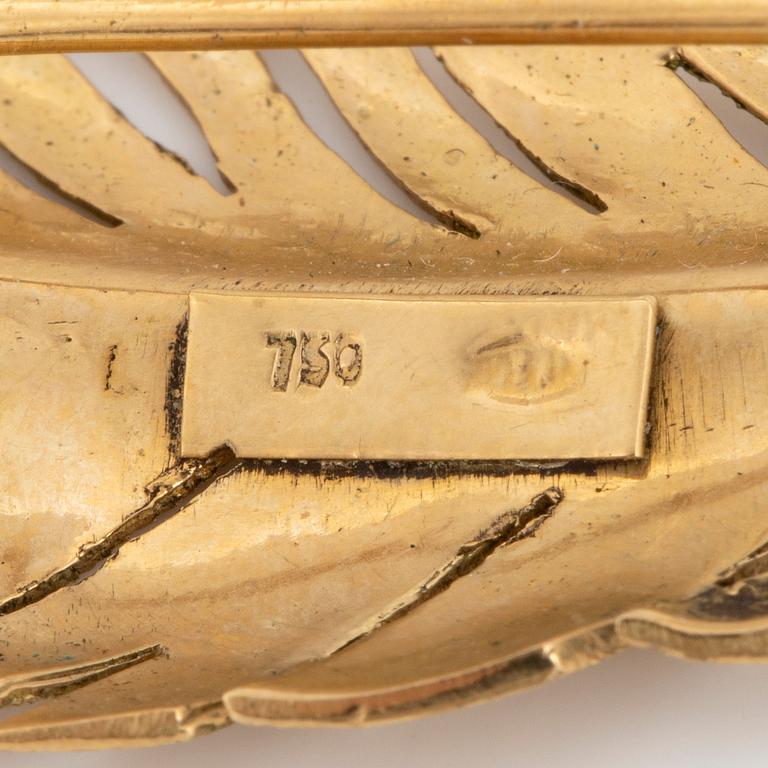 18K gold feather brooch.