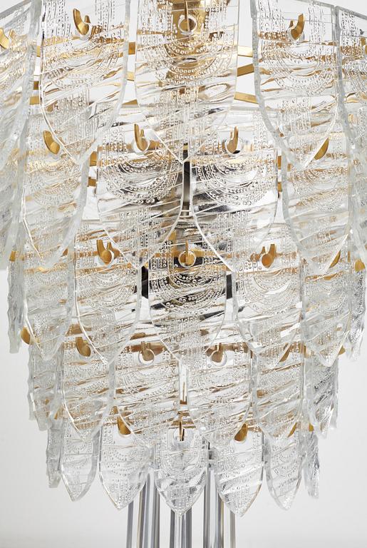 GUNNAR CYRÉN, a glass and gilt bronze chandelier, Orrefors, Sweden 1960's.