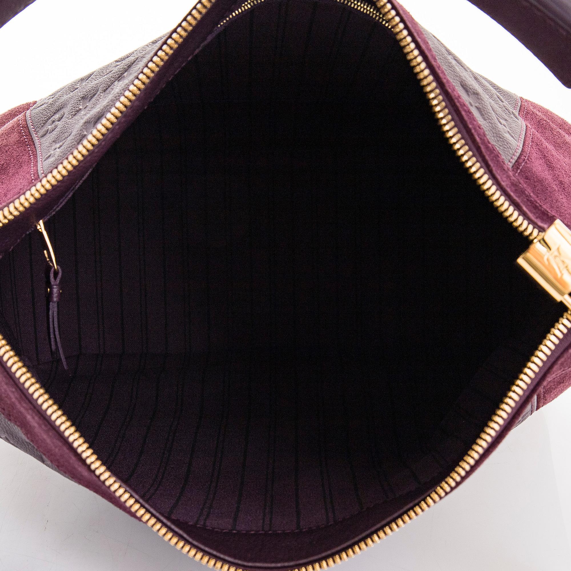 Louis Vuitton, a Monogram Empreinte 'Audacieuse' bag.