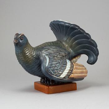 GUNNAR NYLUND, a stoneware sculpture of a grouse, Rörstrand, Sweden.