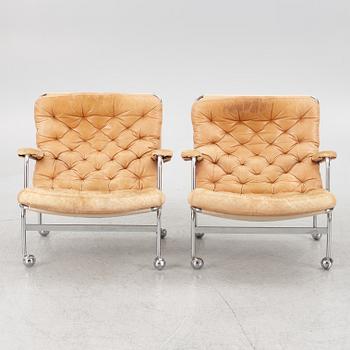 Bruno Mathsson, a pair of "Karin" armchairs, Dux, Sweden, late 20th century.
