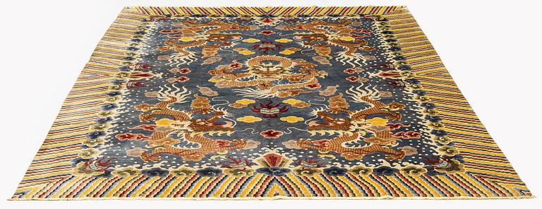 A semi-antique chinese ' Five dragon' silk carpet, c 335 x 254 cm.