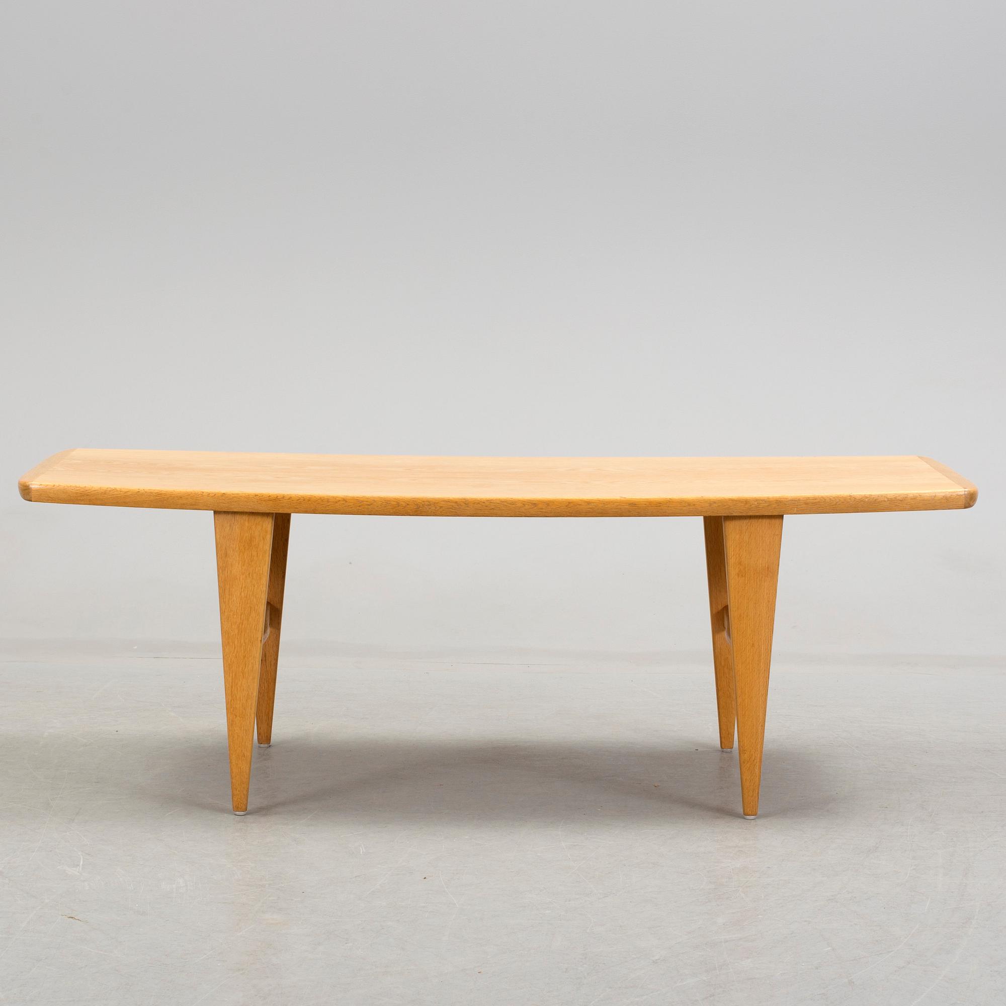 a Svante Skogh oak coffee table from Seffle Möbelfabrik, mid 20th century.