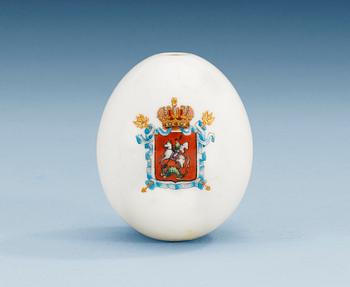 A Russian easter egg with St George and the dragon to one side and the monogram OE with an imperial crown to the other, 19th Century.