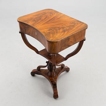 A sewing table from the first half of the 19th century.