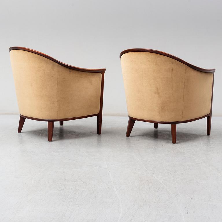 A pair of mahogany 'Fabiola' armchairs from Bröderna Andersson, second half of the 20th Century.