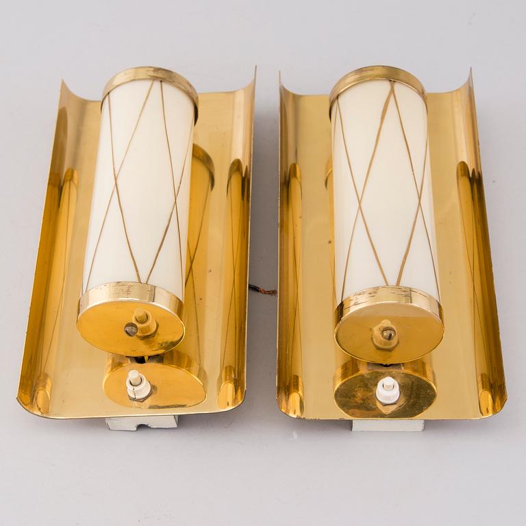 A pair of mid 20th century wall lights for Aris, Arisuo, Finland.