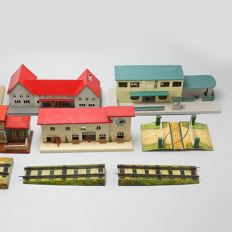 Eight 20th century train model accessories, Germany and England.
