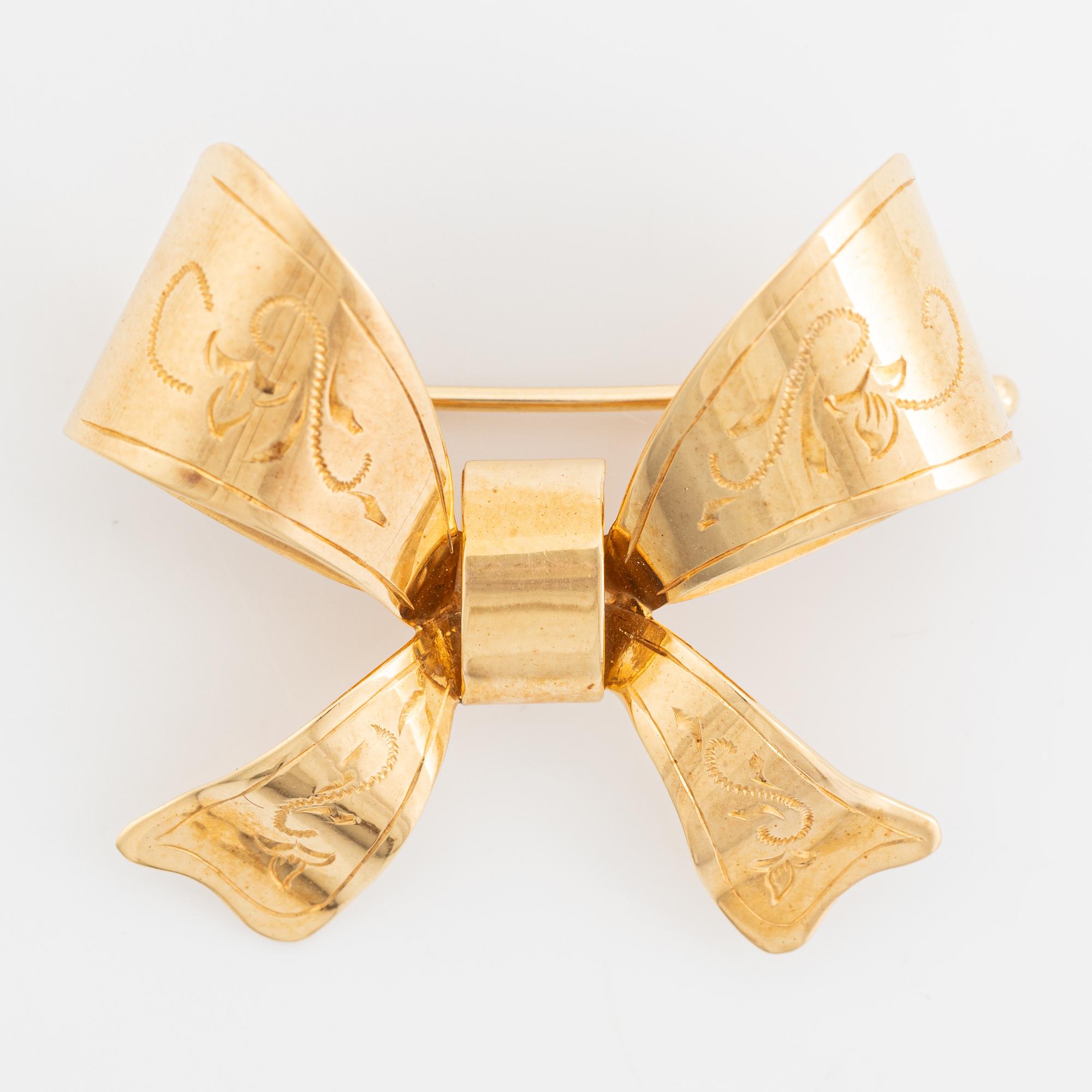 Brooch, bow, 18K gold. Stigbert, Engelbert, Stockholm.