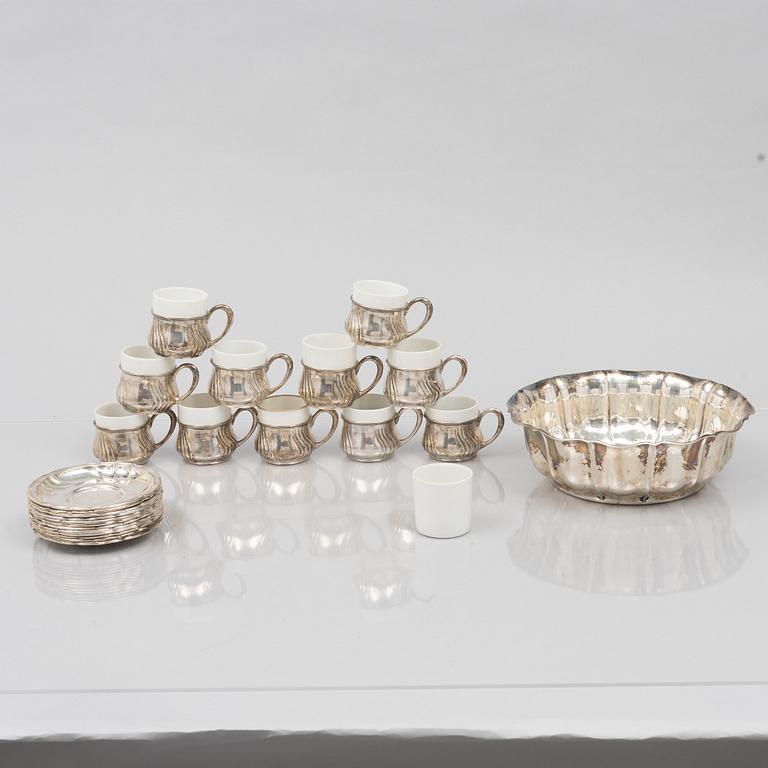 Koppar med fat, 11 st samt skål, silver 800, rokokostil, Tyskland, 1900-tal.